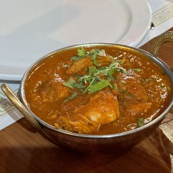 People's Indian Restaurant signature dishes Chicken Tikka MasalaVegetable KormaChicken Momos
